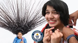 Cutting The Worlds LONGEST HAIR  Guinness World Records [upl. by Hsetim]