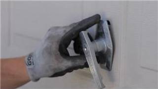 Garage Door Help  How to Replace a Garage Door Lock or Handle [upl. by Ketty]